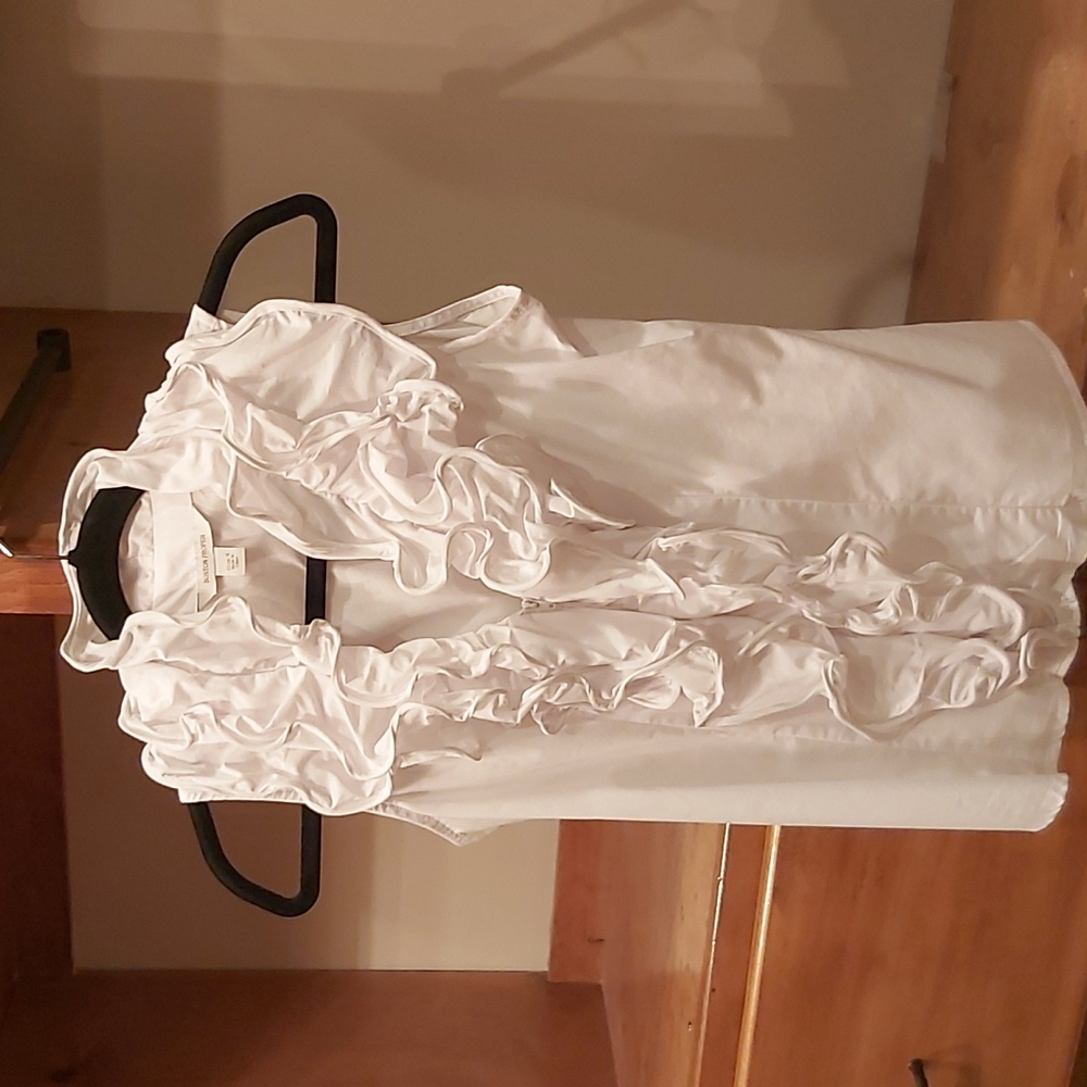 Ruffled blouse.